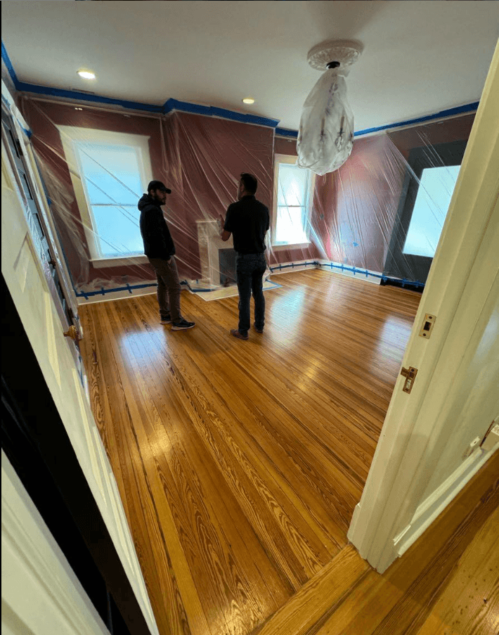 Flooring project 1 — refinishing or installation work.